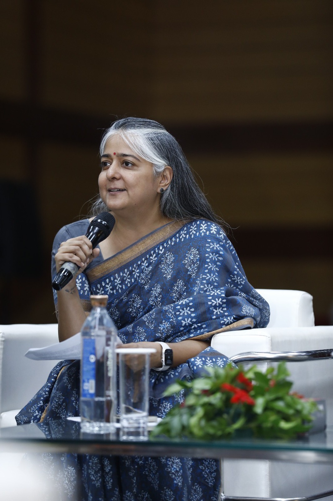 Medha Gandhi speaking at a public health convening